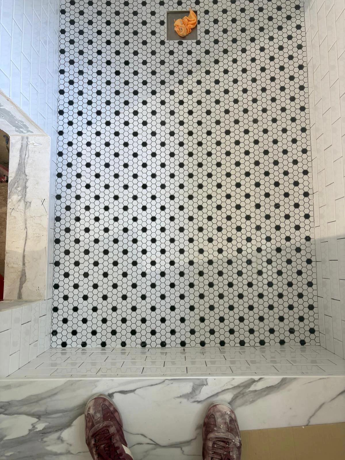 Mosaic shower floor during installation